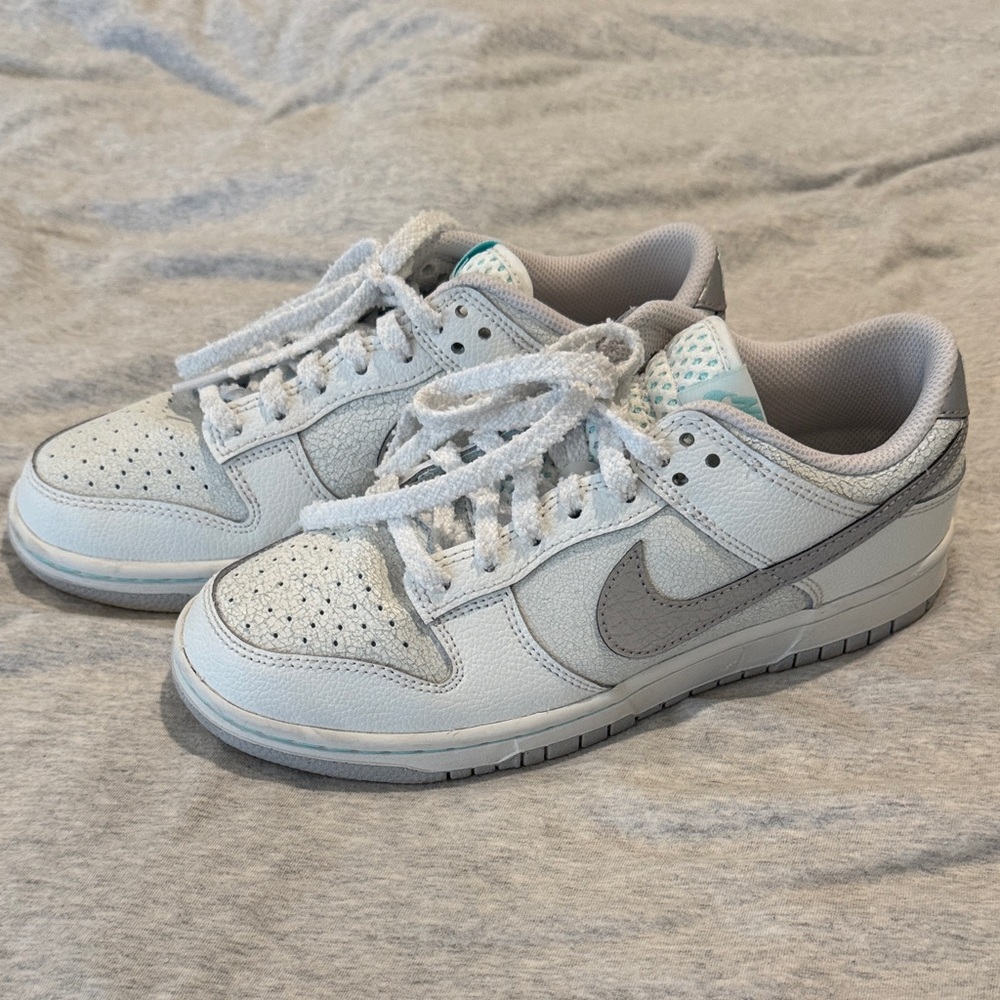Nike dunk white and gray distressed sneakers. Blue accent. Fuzzy laces. 6m/7.5w